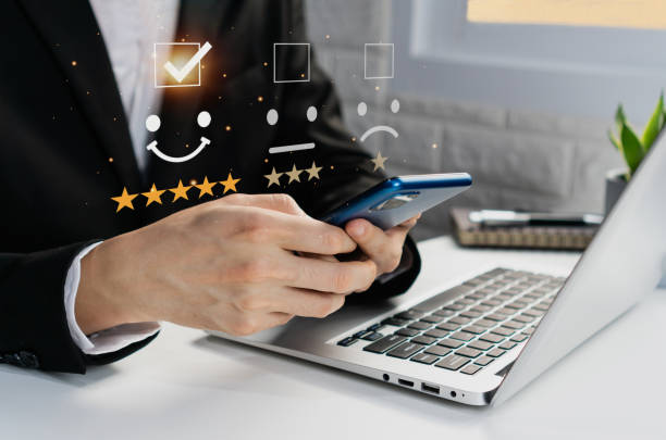 istock User give rating to service experience on online application. 5-star rating very impressed. Customer satisfaction and evaluation for good quality product and service. Cop space, closeup 1416163228