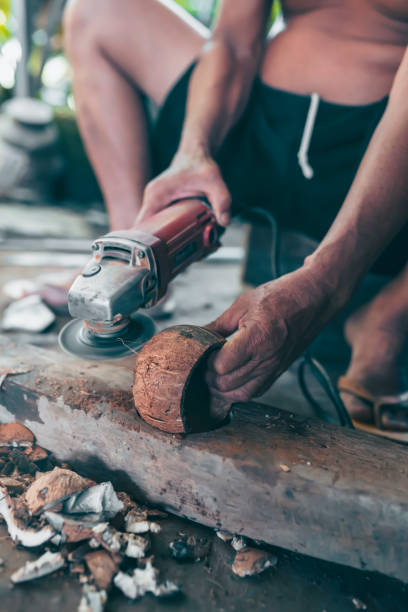 istock Using electric blades to sharpen coconut shells to be smooth. 1416164279