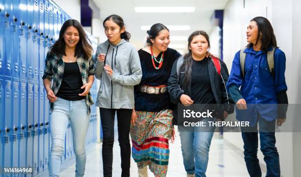 High Schoolers Walking On A Corridor At School Stock Photo - Download Image Now - Indigenous Peoples of the Americas, Student, High School Student