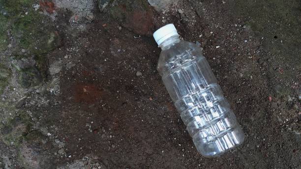 istock Used plastic bottle on the ground 1416169476