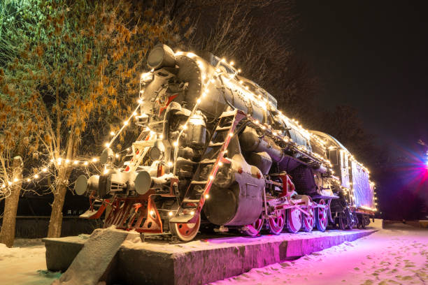 An old train decorated with multi-colored New Year's illuminations. stock photo