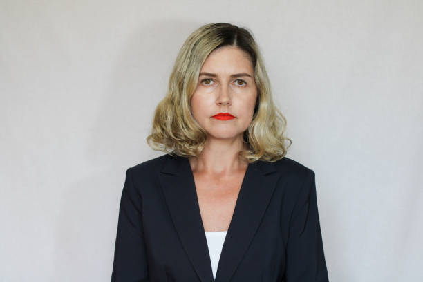 istock Beautiful middle-aged blond woman on a white background 1416180177