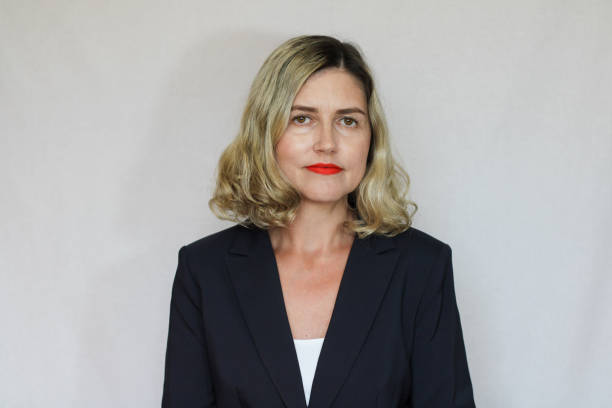 istock Beautiful middle-aged blond woman on a white background 1416180178