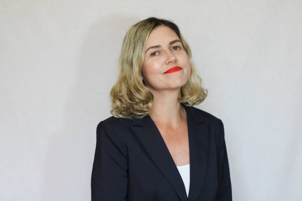 istock Beautiful middle-aged blond woman on a white background 1416180188