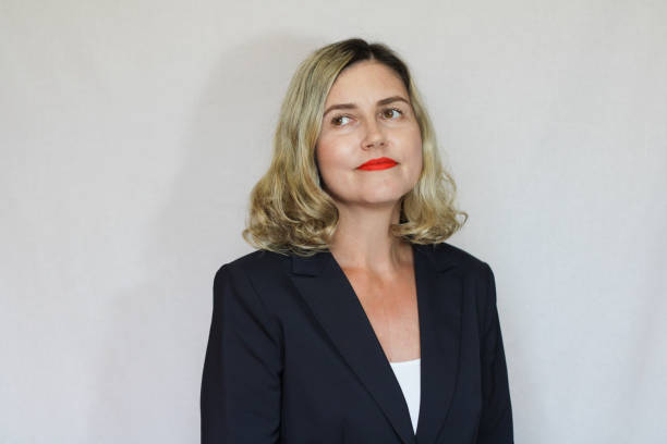 istock Beautiful middle-aged blond woman on a white background 1416180191
