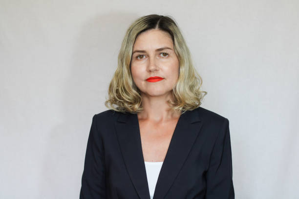 istock Beautiful middle-aged blond woman on a white background 1416180748