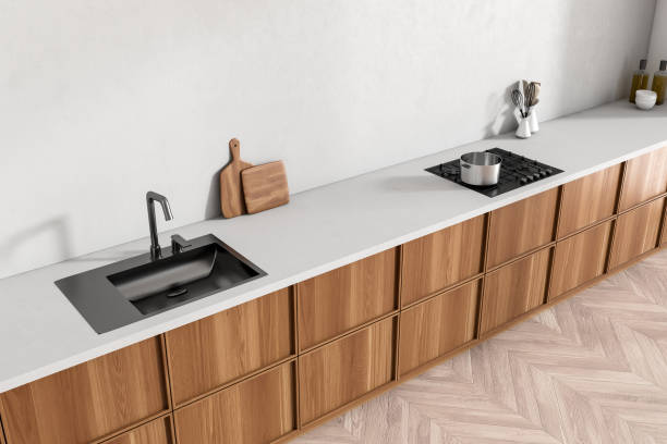 istock Top view of light kitchen interior with sink and stove, kitchenware on deck 1416190330
