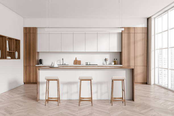 istock Light kitchen interior with countertop and seats, shelves and decoration, window 1416192137
