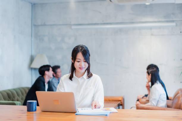 istock A businesswoman doing clerical work in an office 1416193569