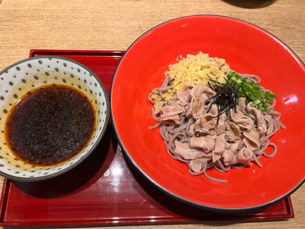 Meat on soba noodle with spicy sauce stock photo