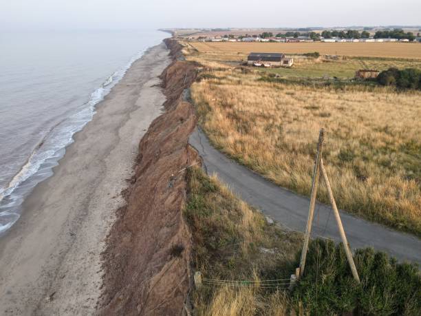 istock UK road falling into the sea (coastal erosion) 1416211460