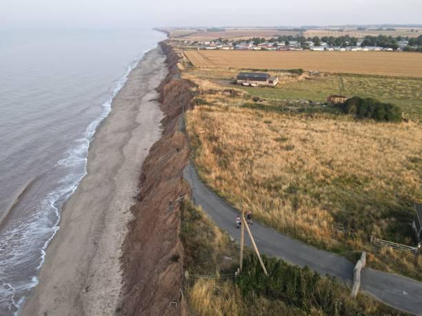 istock UK road falling into the sea (coastal erosion) 1416211492