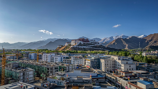 the Potala Palace seen from the Square, downtown in Lhasa, Tibet Autonomous Region, China.