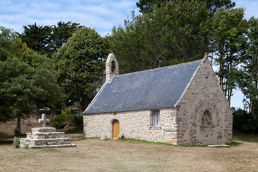 The Saint-Gonveld Chapel and its cross in the town of Landunvez in Finistere, Brittany.