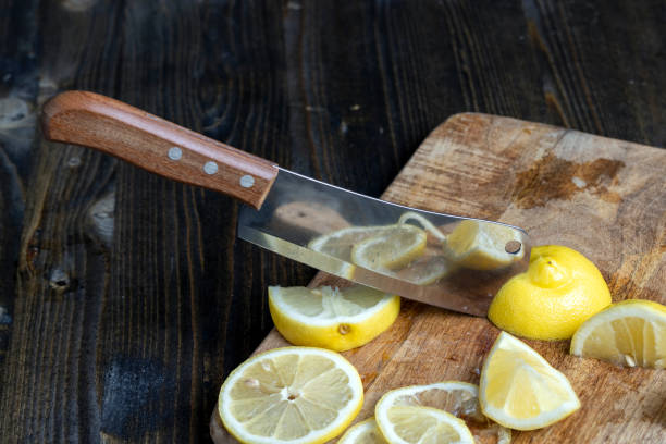 istock Ripe yellow lemon cut into pieces 1416230181