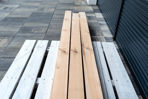 istock Raw planed pine wooden beams, dimensions 100x100mm, lying next to each other. 1416232304