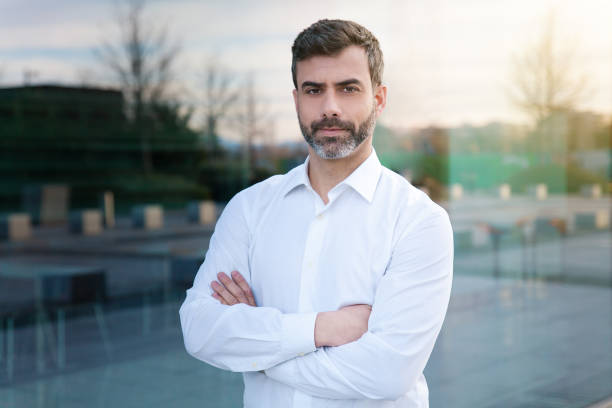 istock Businessman looking at camera outdoors 1416241119