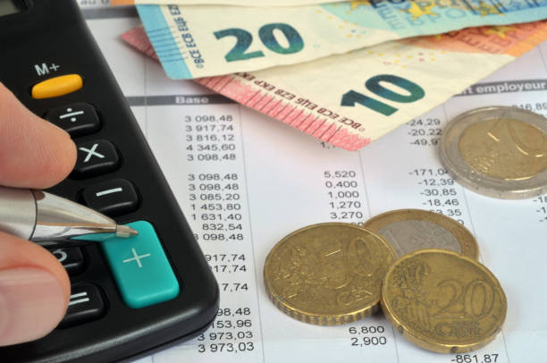 istock Payslip and cash 1416245421