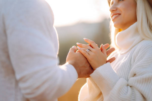 istock Young couple having fun walking and hugging n the park. 1416246409