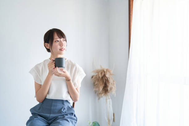 istock A woman relaxing in a simple space 1416273238