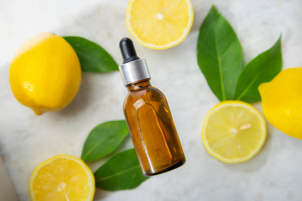 istock essential oil bottle with lemon 1416286296