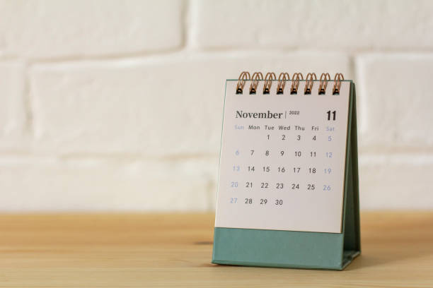 istock Desktop calendar for November 2022 on the table. 1416296597
