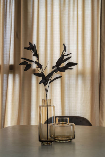 istock Glass vases for home decor on the table in a modern interior 1416307584