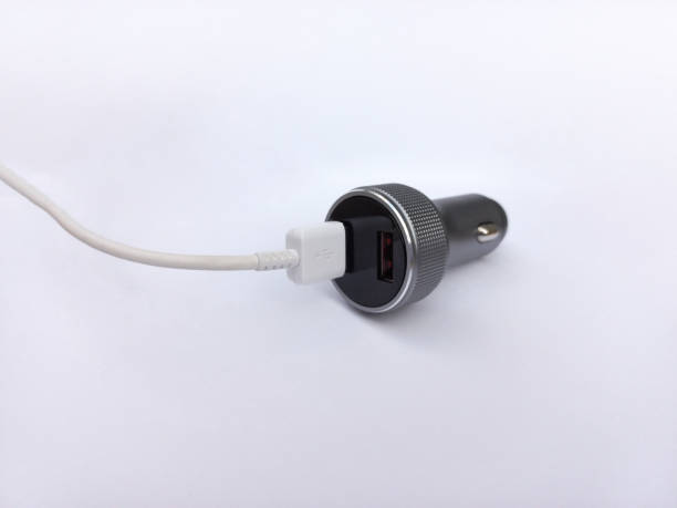 istock Black USB electronics device car charger isolated on white 1416318614