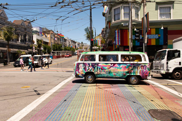 iconic hippie bus on the city street in san francisco - castro street imagens e fotografias de stock