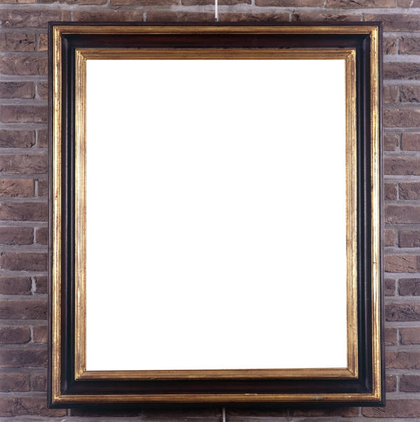 istock Picture frame hung on the wall by a picture rail 1416326640