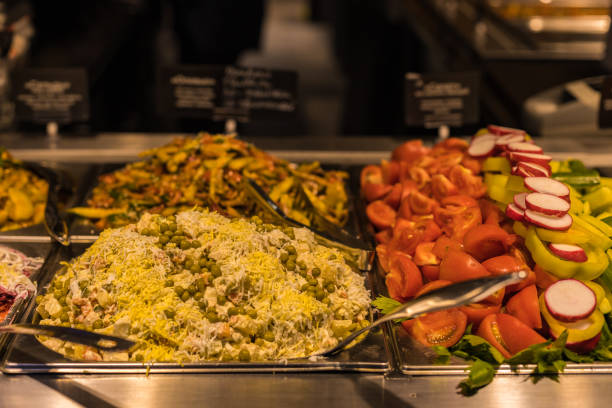 istock Fresh salads and chopped vegetables to choose from according to the buffet system. 1416326658