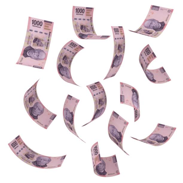 istock Mexican money peso falling finance crisis 1416338947