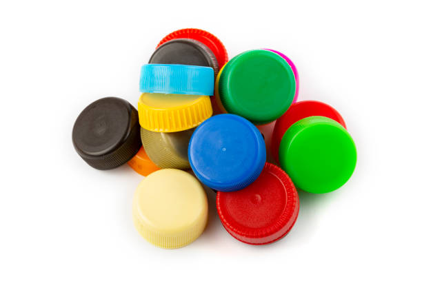 istock olorful plastic caps on white background, recycle for environment concept. Separate wa 1416340020