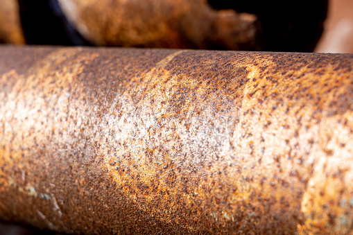 Close-up of a metal tube with rust on a shipyard. With copy space. Shot with a 35-mm full-frame 61MP Sony A7R IV.