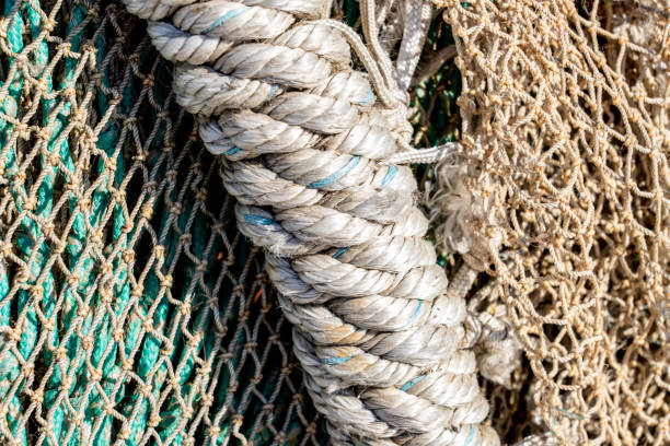 istock Thick rope and fishing nets on a shipyard 1416351588