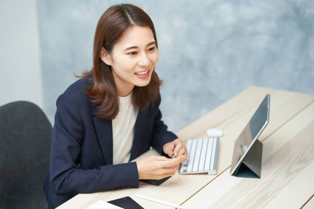 istock Business woman responding with a smile 1416390693