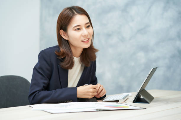 istock Business woman responding with a smile 1416391229