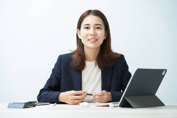 istock Business woman responding with a smile 1416393372