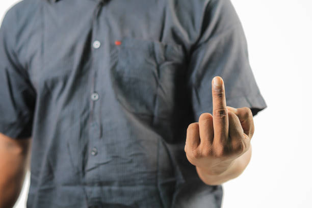 istock Man showing middle finger, insulting gesture. 1416397286
