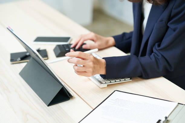 istock business woman doing desk work 1416404791