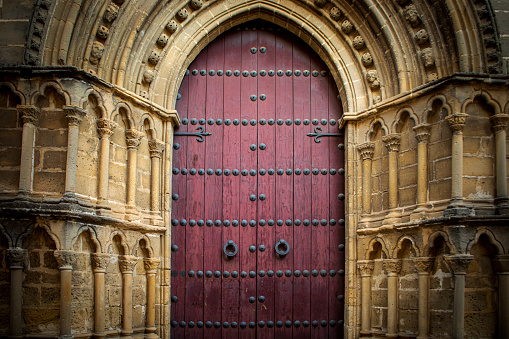 couple standing outside Girona Cathedral doors