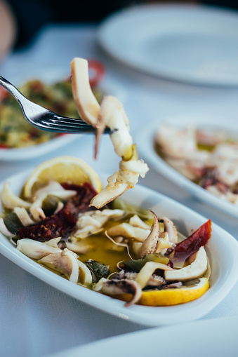Octopus salad with dried tomato and lemon