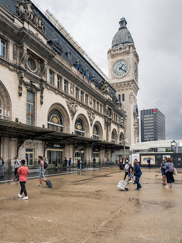 View from the forecourt of the station building, with travelers and commuters in the picture. 06/08/2022 - Place Louis-Armand, 12th arrondissement, 75012 Paris, France