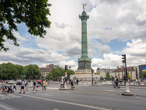 View across Boulevard Henri-IV and a pedestrian crossing to the Place de la Bastille and the Column of July monument.  06/04/2022 - Pl. de la Bastille, 11th arrondissement 75004 Paris, France