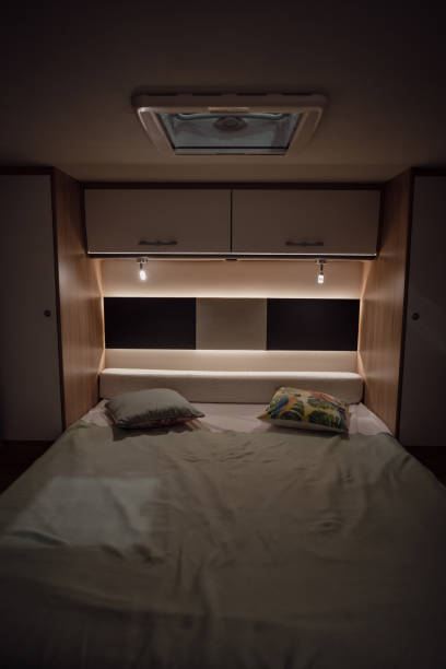 istock Bed inside a new luxury camper van motorhome 1416422478