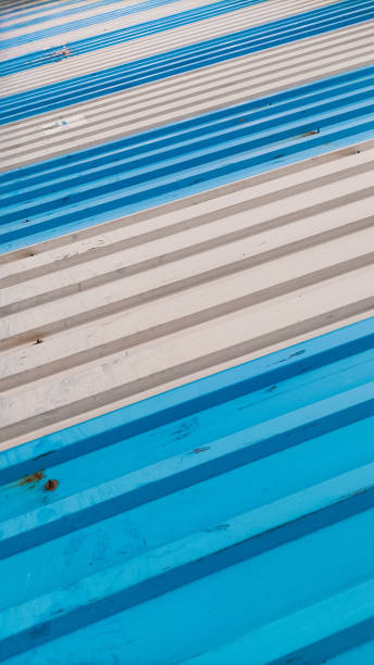 istock Pattern created by Steel sheet fence, painted Blue and White alternatively 1416425907