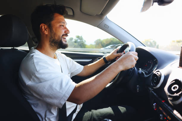 istock Driver man is driving and enjoy travel 1416437843