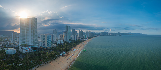 Drone view of Nha Trang city at sunset from the sea, Khanh Hoa province, central Vietnam