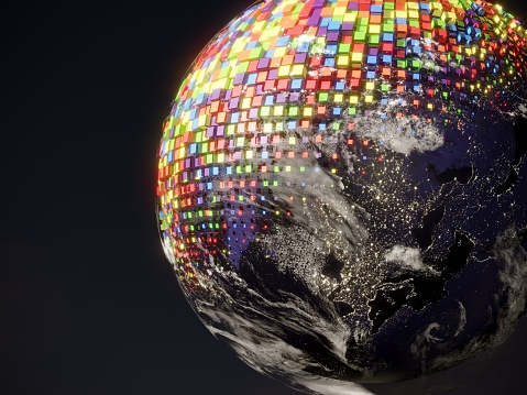 Multi colored blocks covering the Earth, symbolizing blockchain and  global financial technology. All the world map textures are originally from NASA. ( 3d render )Map sources Url:  -https://earthobservatory.nasa.gov/features/NightLights/page3.php (color map )-https://visibleearth.nasa.gov/view.php?id=57747 (clouds map )