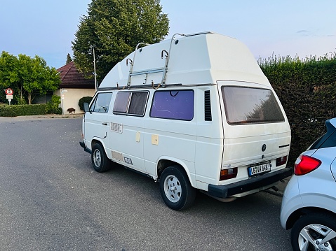 Erdmannhausen, Germany - August, 16 - 2022: Old RV vehicle, VW Bus parked at a street.